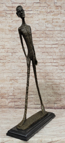 Walking Man by Alberto Giacometti