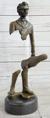 surrealist bronze sculpture of johann strauss holding violin case