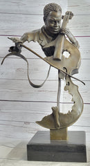 abstract bronze sculpture of an African American cellist