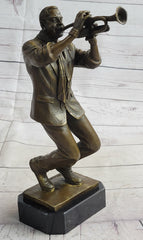 Bronze sculpture of an African American jazz musician playing trumpet