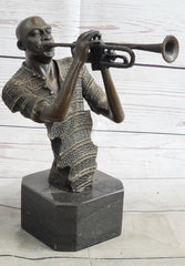 bronze sculpture of African American trumpet player