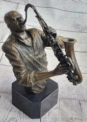 Bronze sculpture of Isaac Hayes playing saxophone