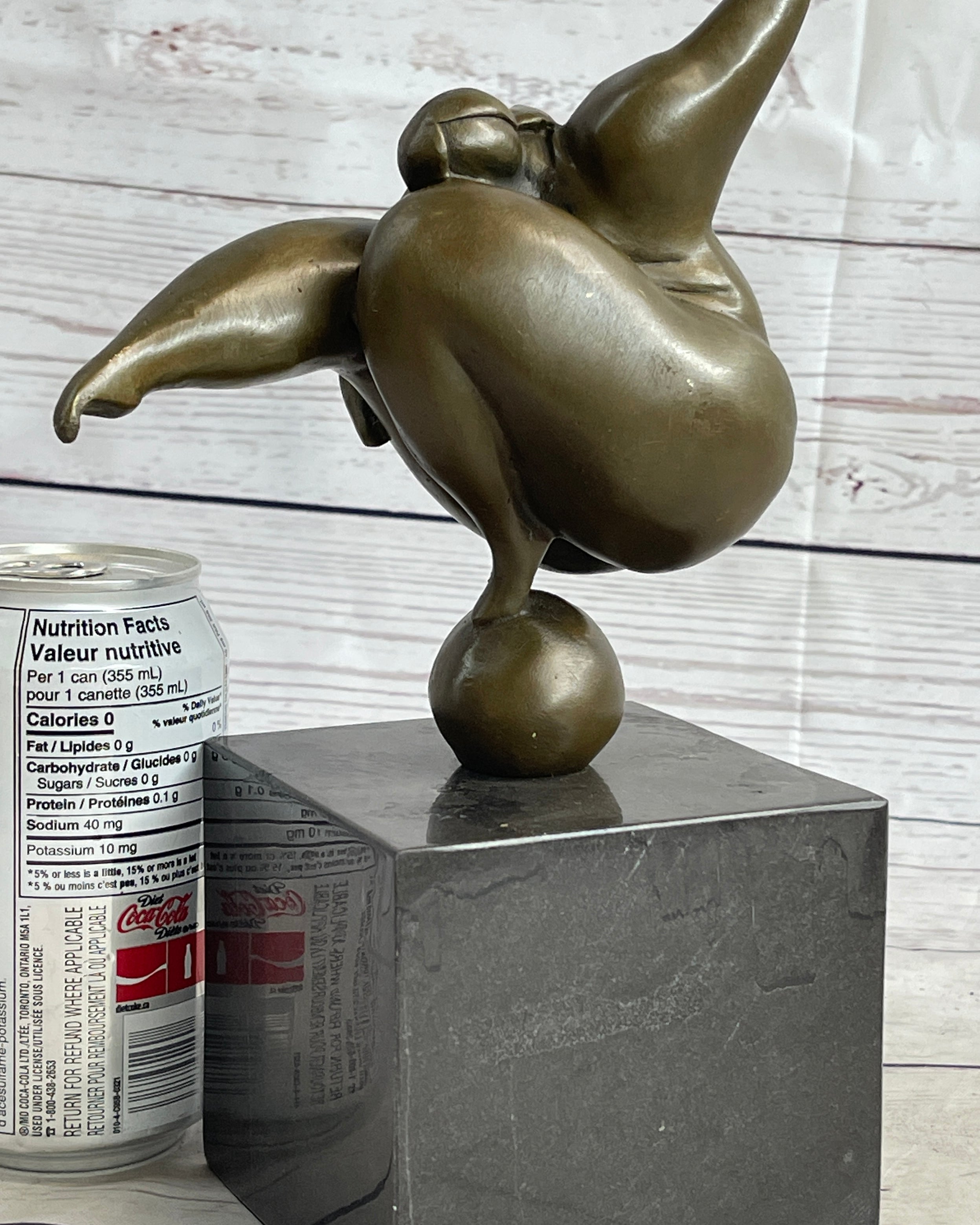 Bronze sculpture work, extremely shapely body, per by SANAT56 on DeviantArt