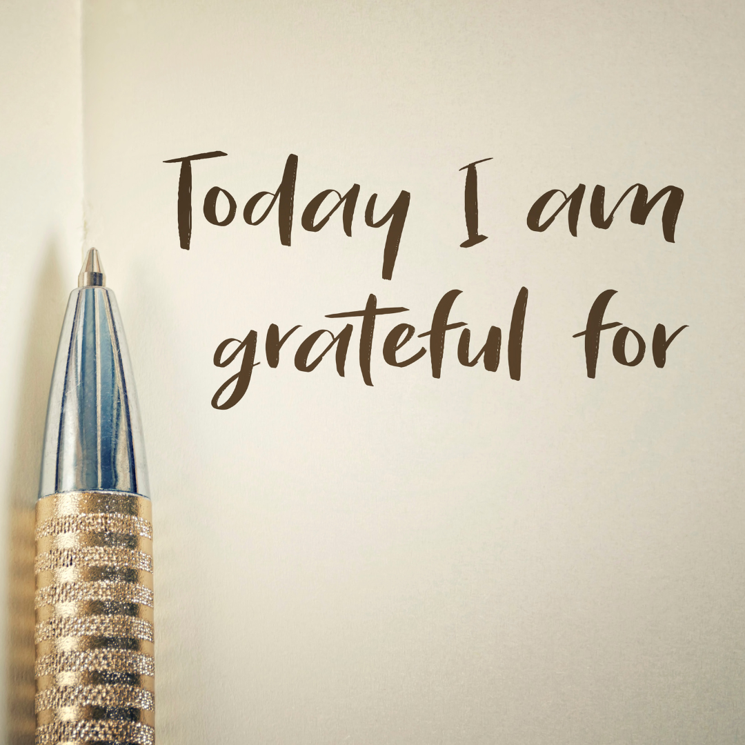 a pen on a paper that says: today I am grateful for