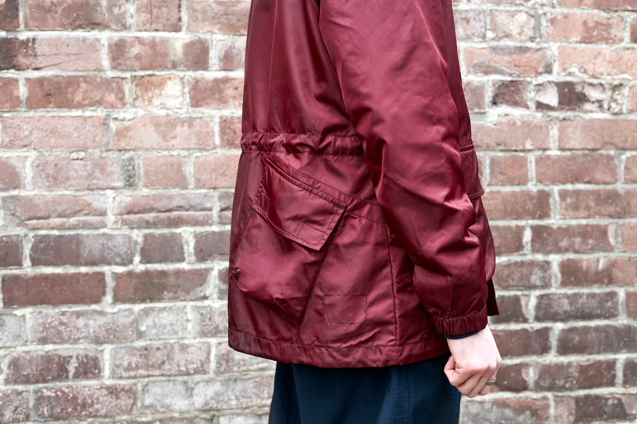 Universal Works red nylon jacket with large back pocket
