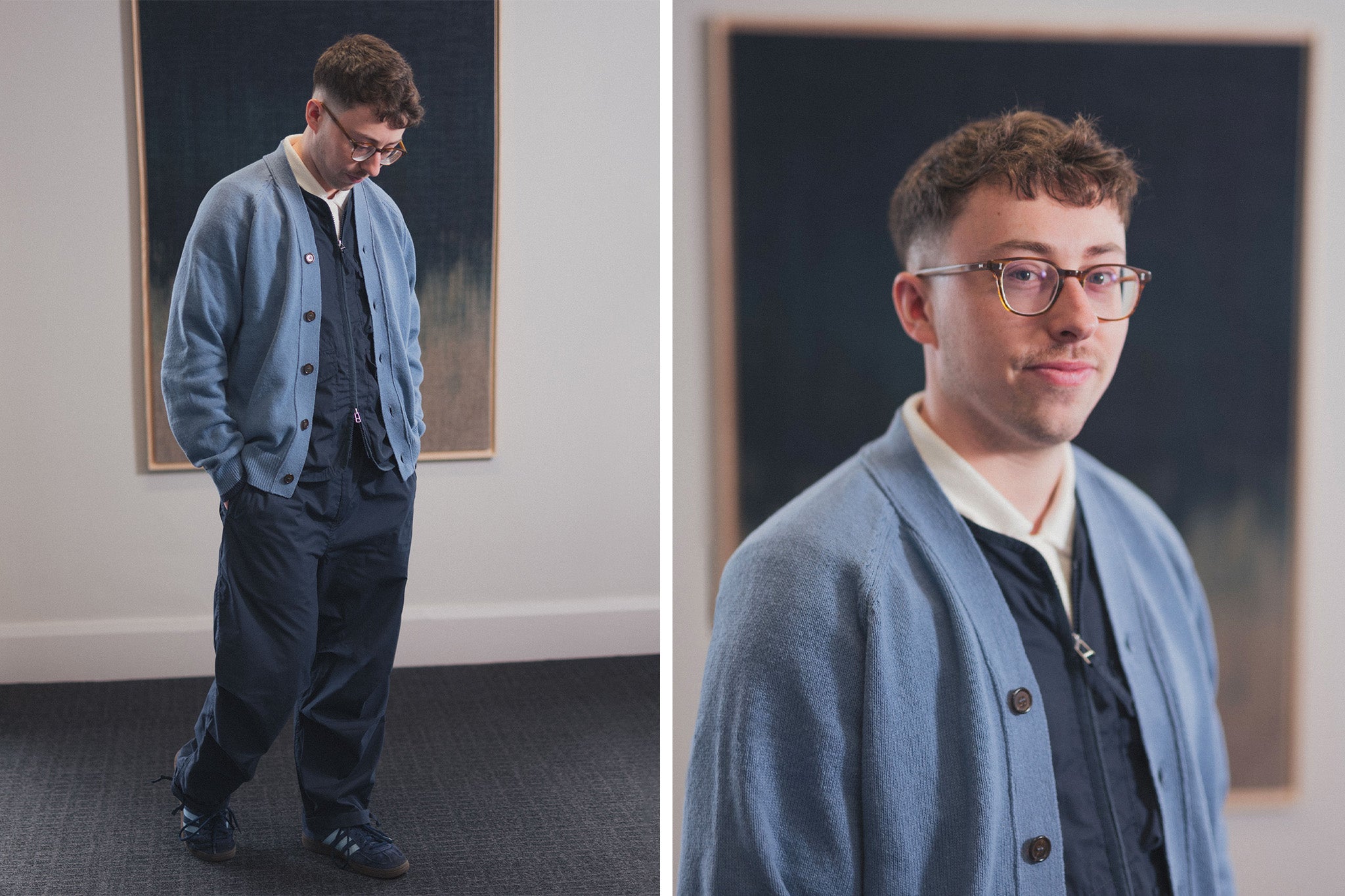 Man in glasses stood in front of avant guard art work wearing Spring Summer '24 collection