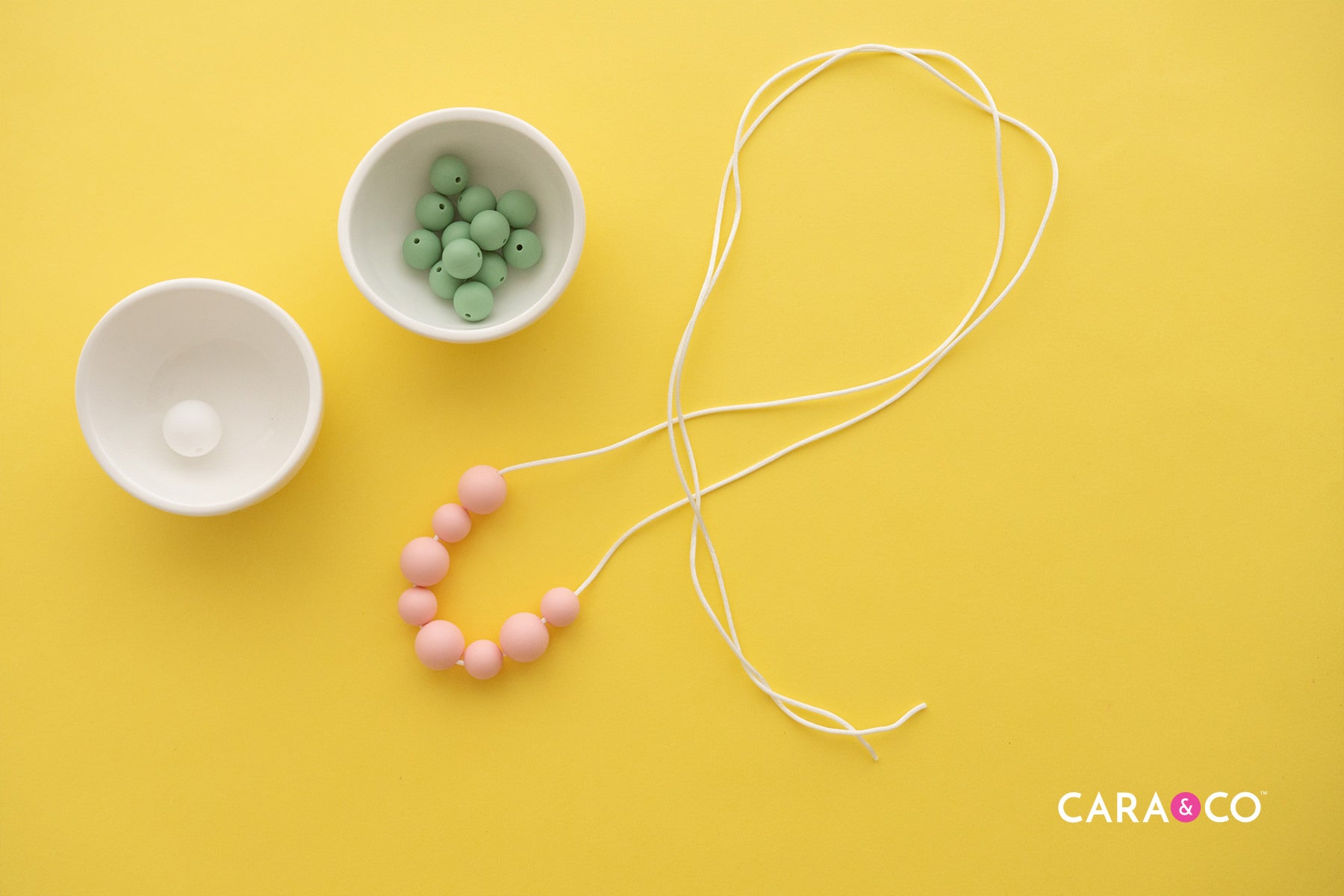 Center your beads on your Cord - Silicone Flower Tutorial - Cara & Co