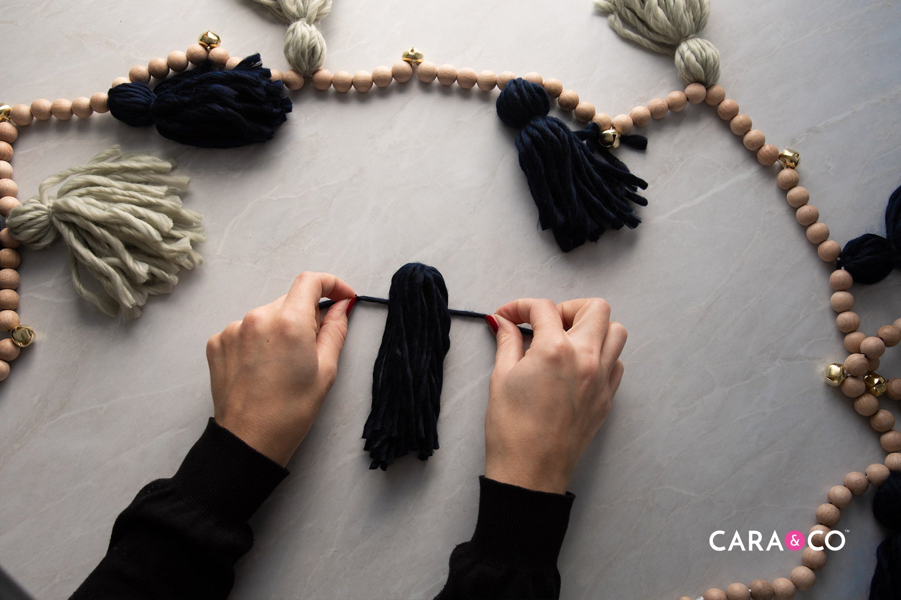 Modern Holiday Garland DIY - DIY Wool Tassel Tutorial