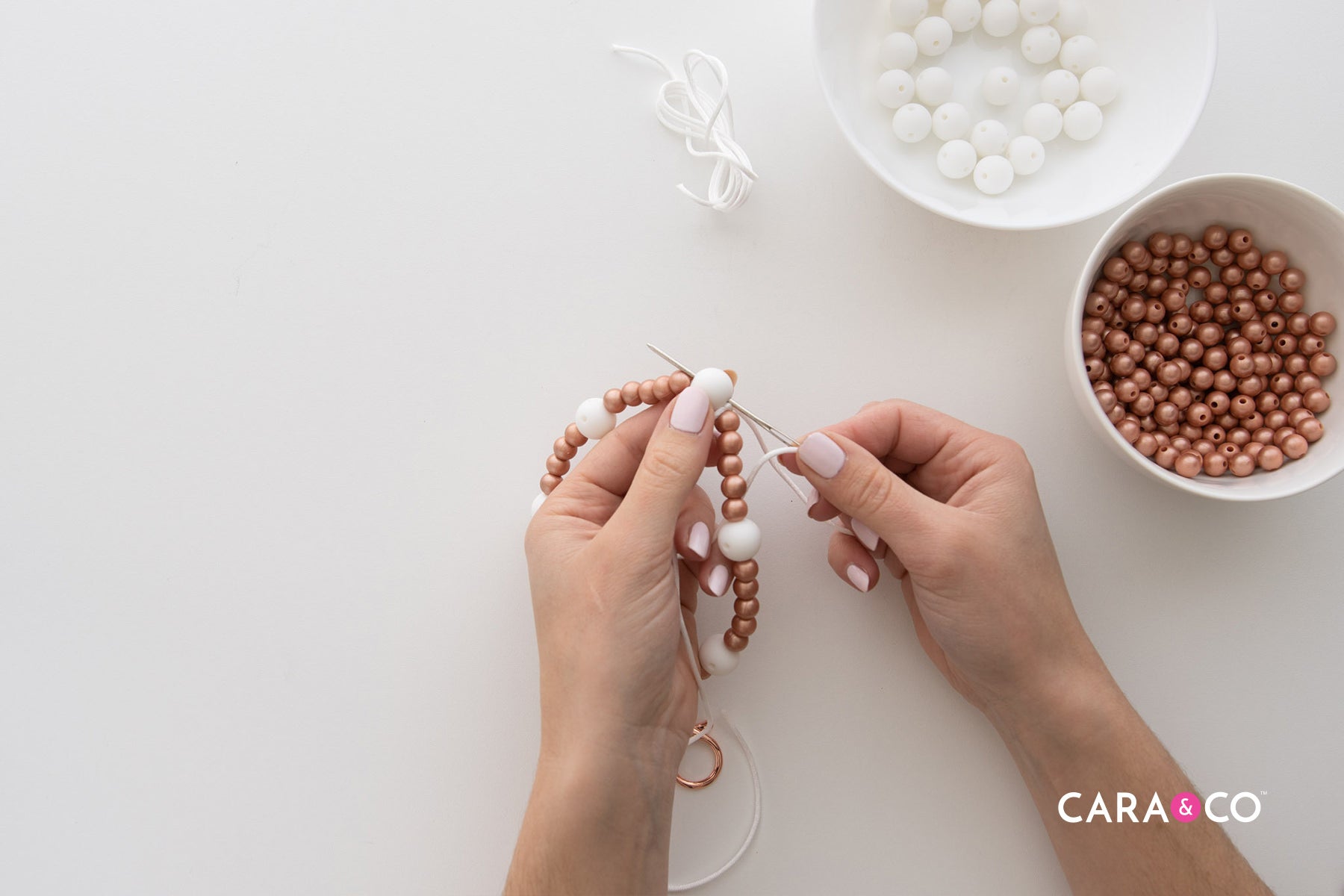 Double hole bead infinity wristlet - Cara & Co DIY Tutorials