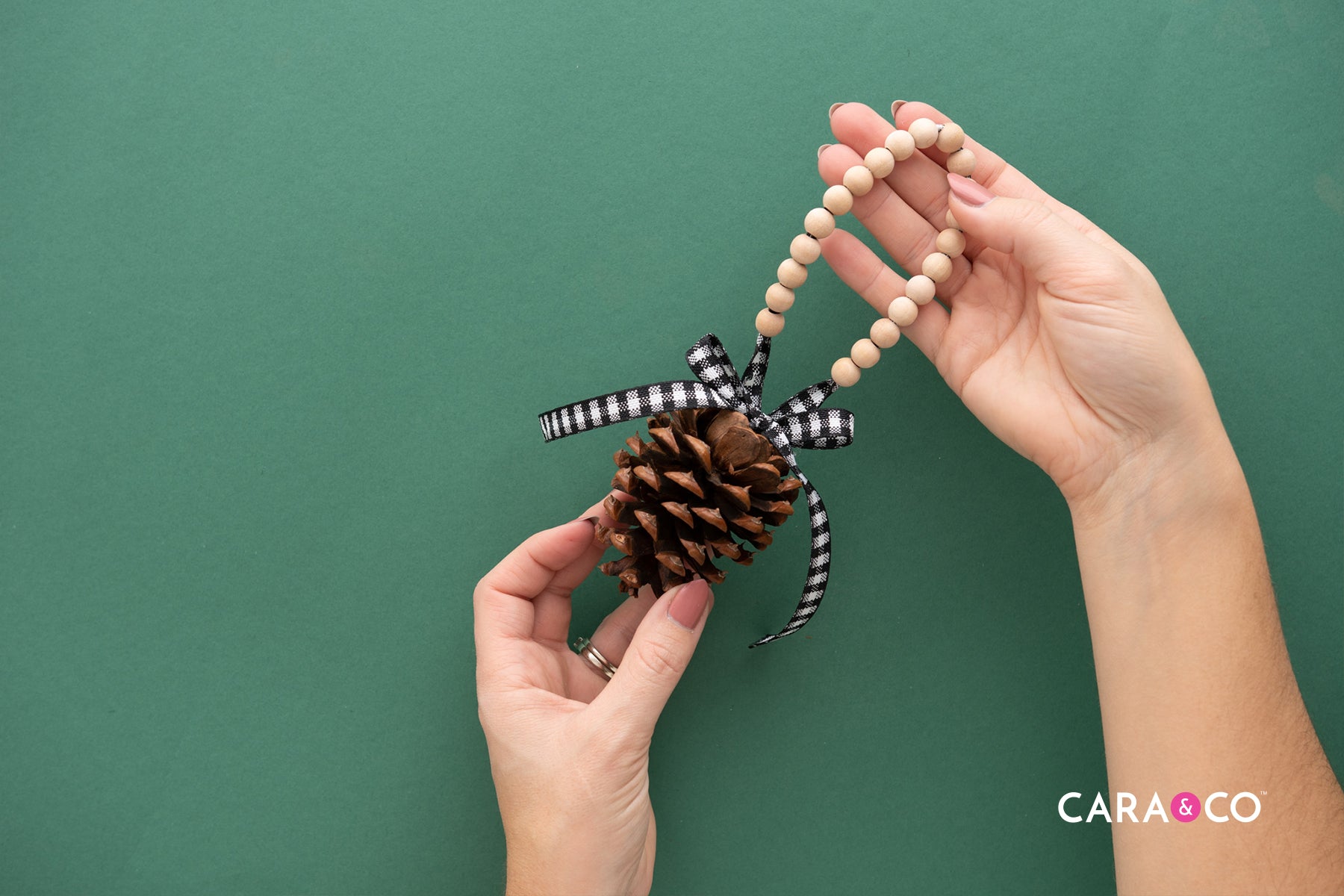 Pinecone and Wood Bead Ornament - DIY Tutorial - Cara & Co