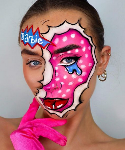 model wearing a pop art makeup look on half of her face