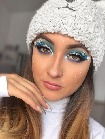 frosty makeup look with snowflakes created by eyeliner