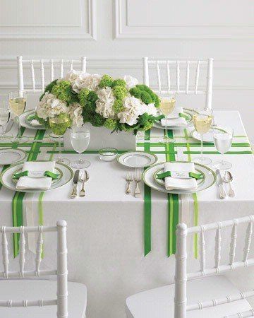 Three white/green striped table runners placed lengthwise and widthwise