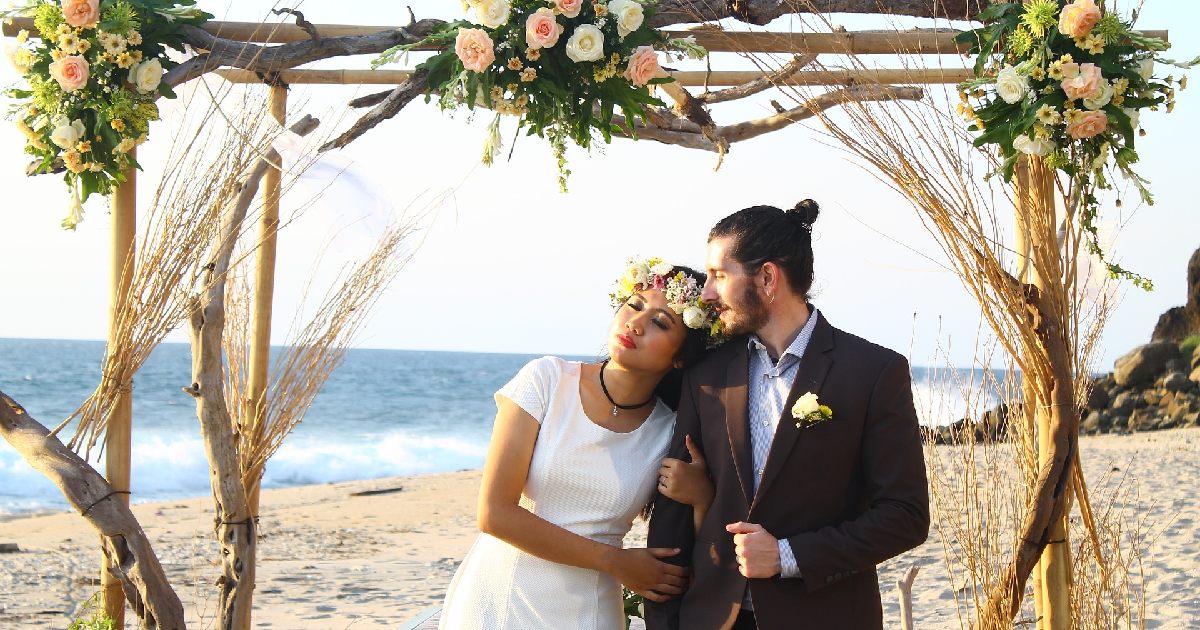 When it comes to a beach wedding, an arch decor is a crucial element
