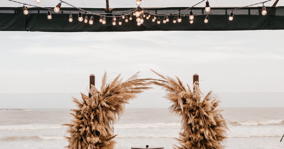 Elegant string lights instantly transform beachfront location into a magical space.