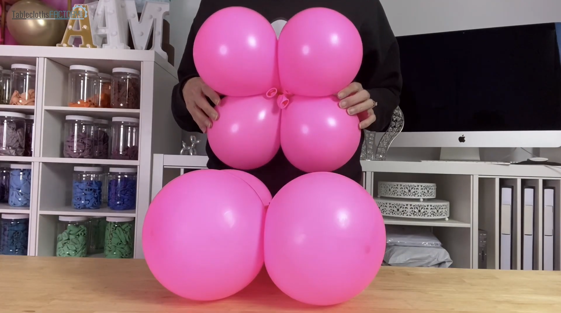 Inflating pink balloons