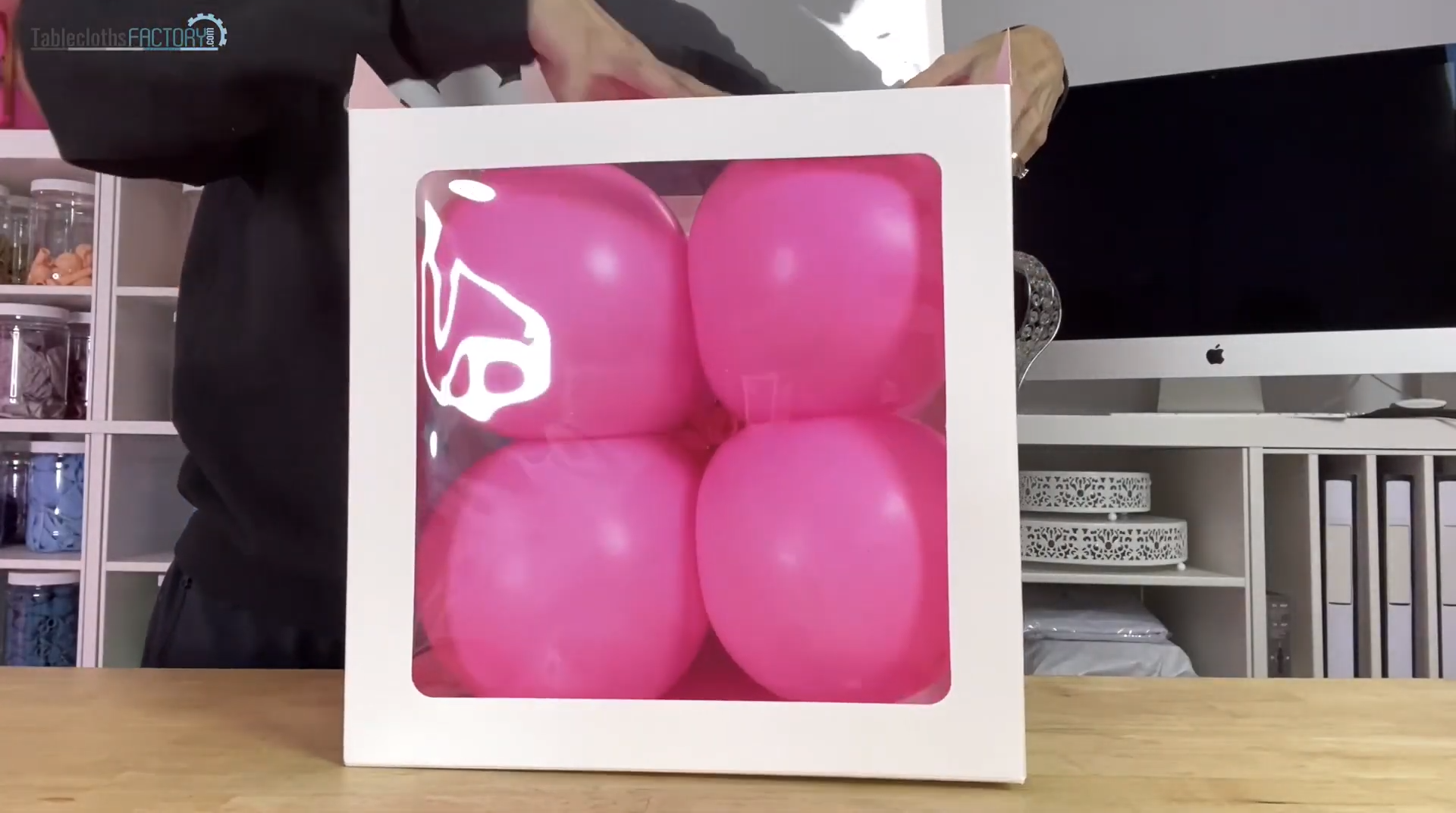 Placing the pink balloons into the display box