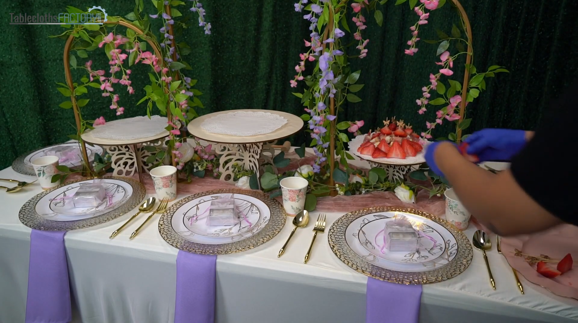 Elegantly set dining table with spring party decor.