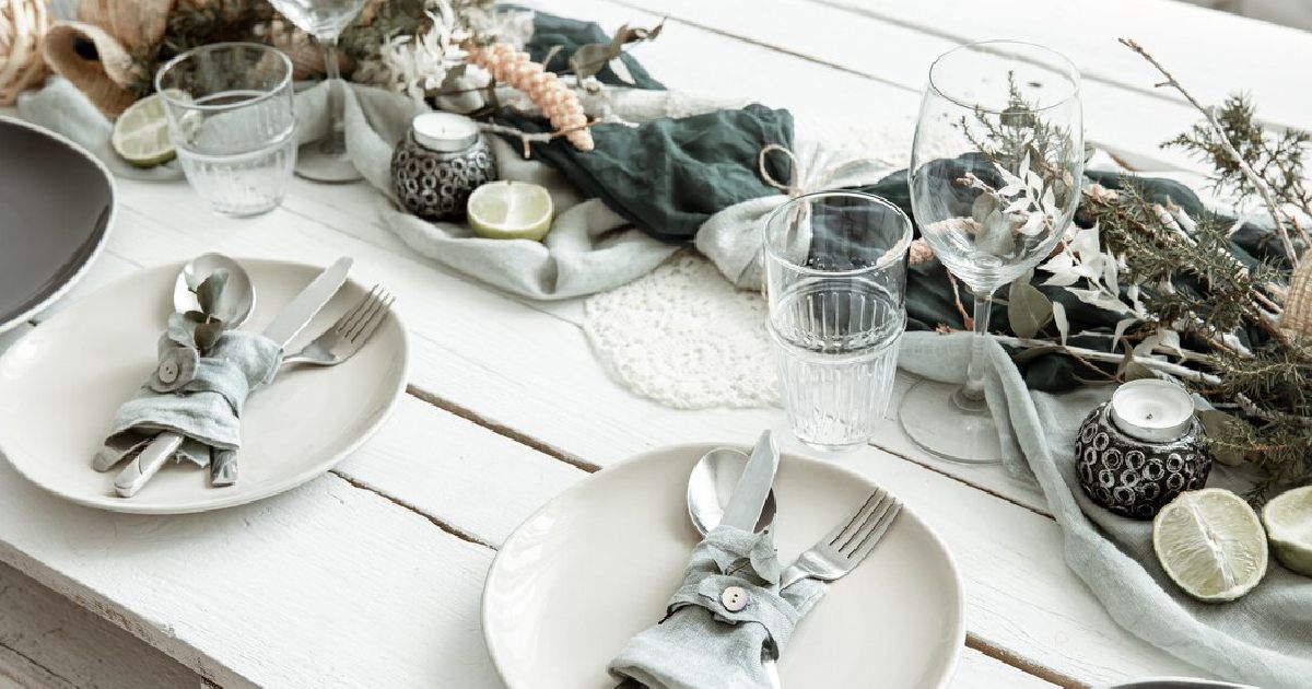 stylish-festive-table-setting-with-scandinavian-decor-details-wooden-surface
