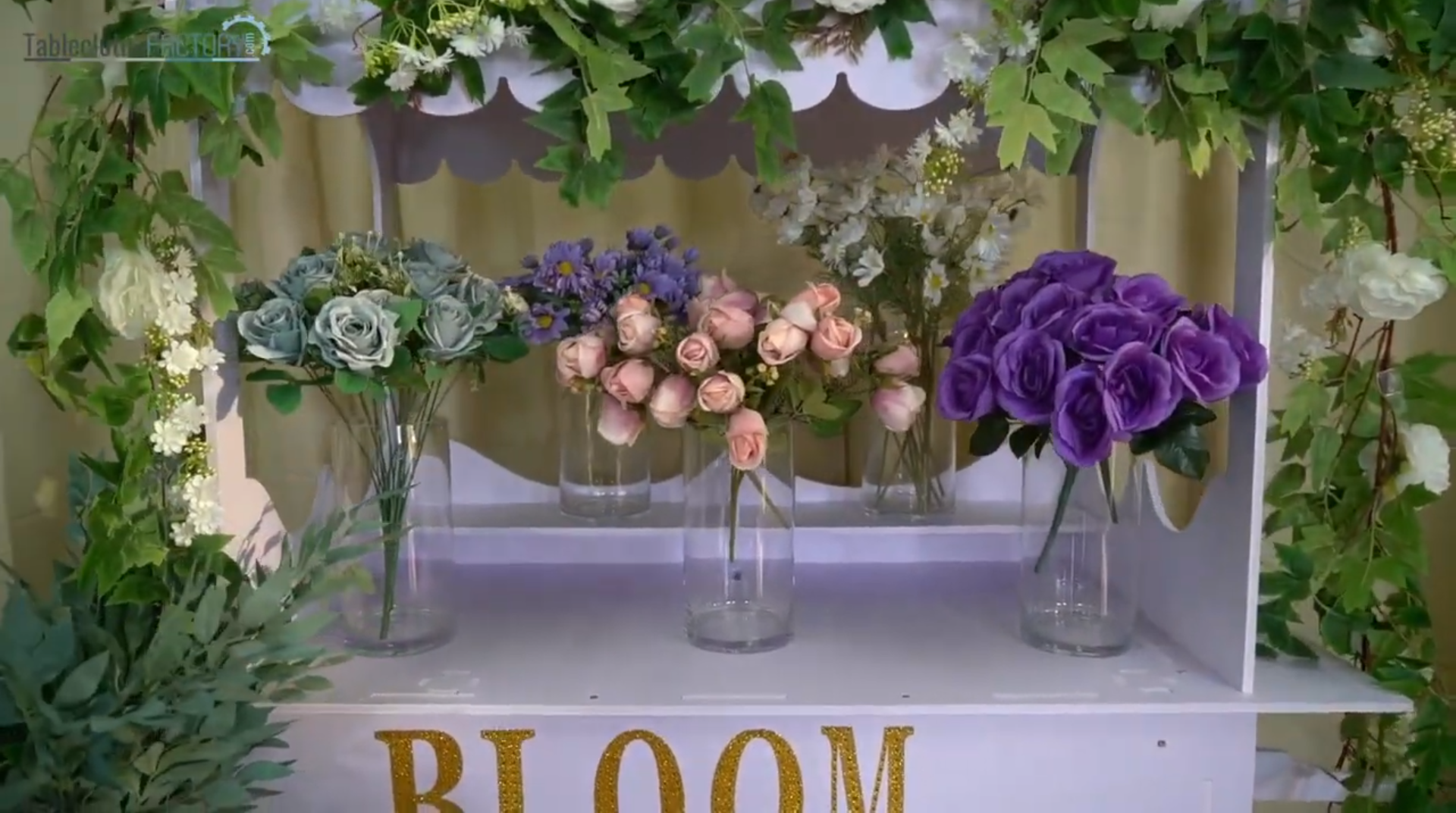 Stylish Mother's Day decor with a bloom bar and beautiful floral displays.