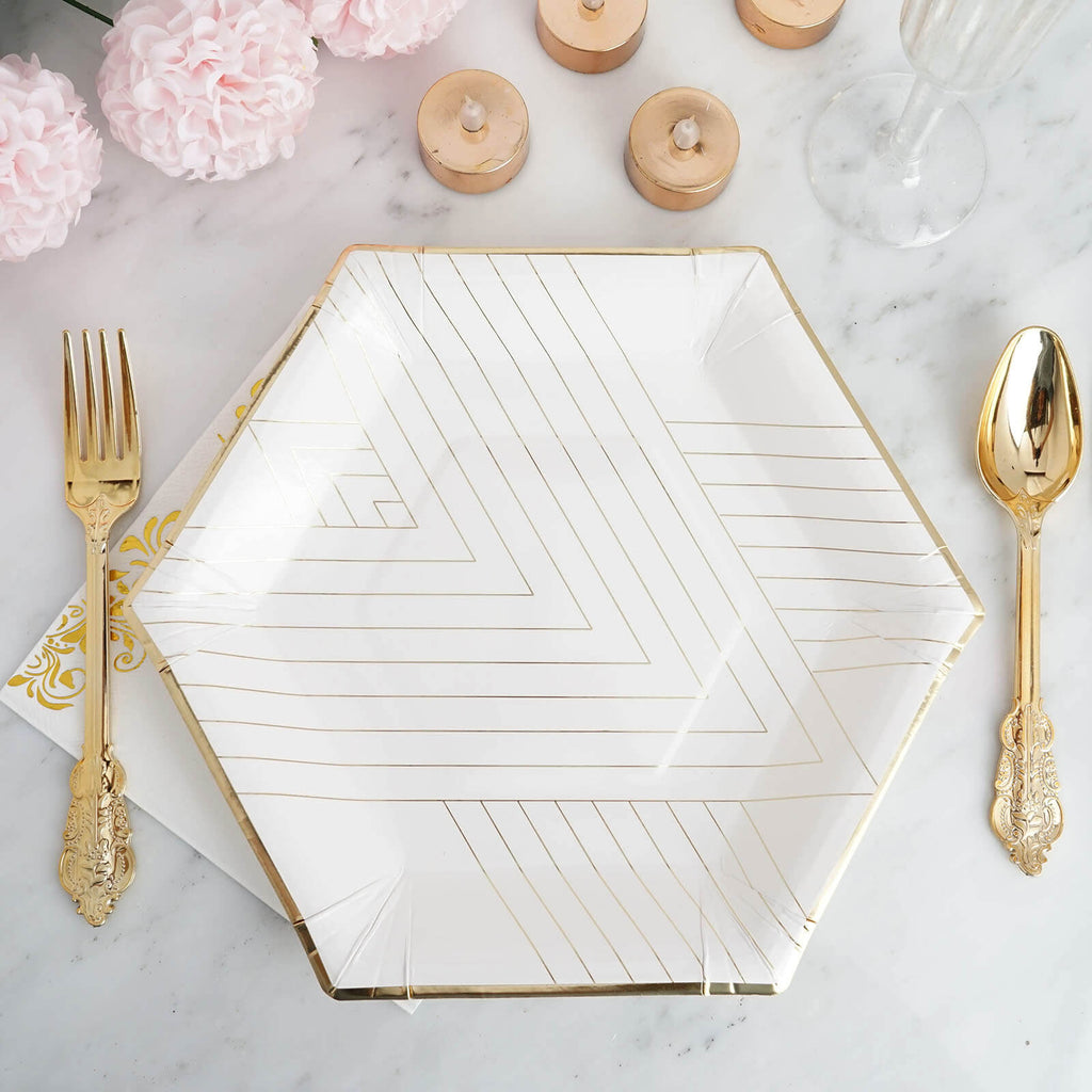 white and gold paper plates