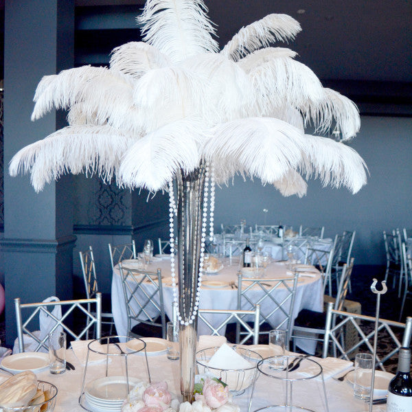 white ostrich feather centerpieces