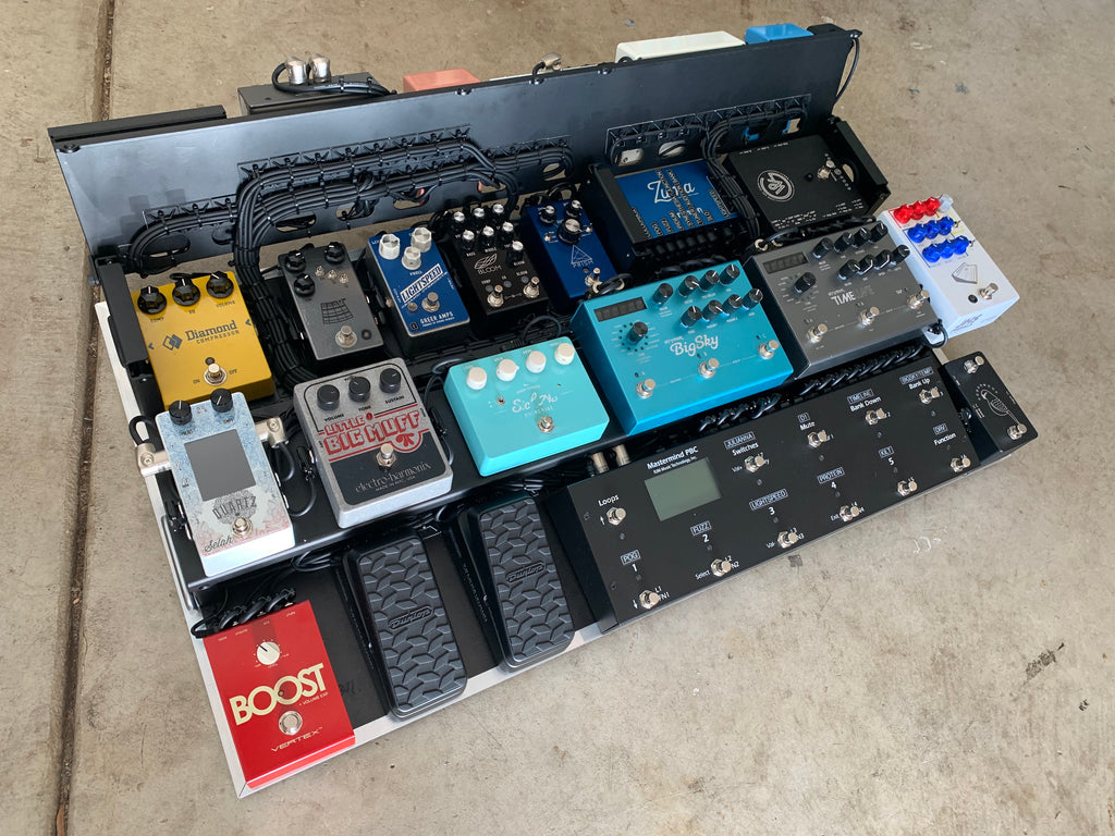 pedal board with multiple risers