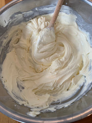 Mix the cream cheese, icing sugar, vanilla extract and double cream
