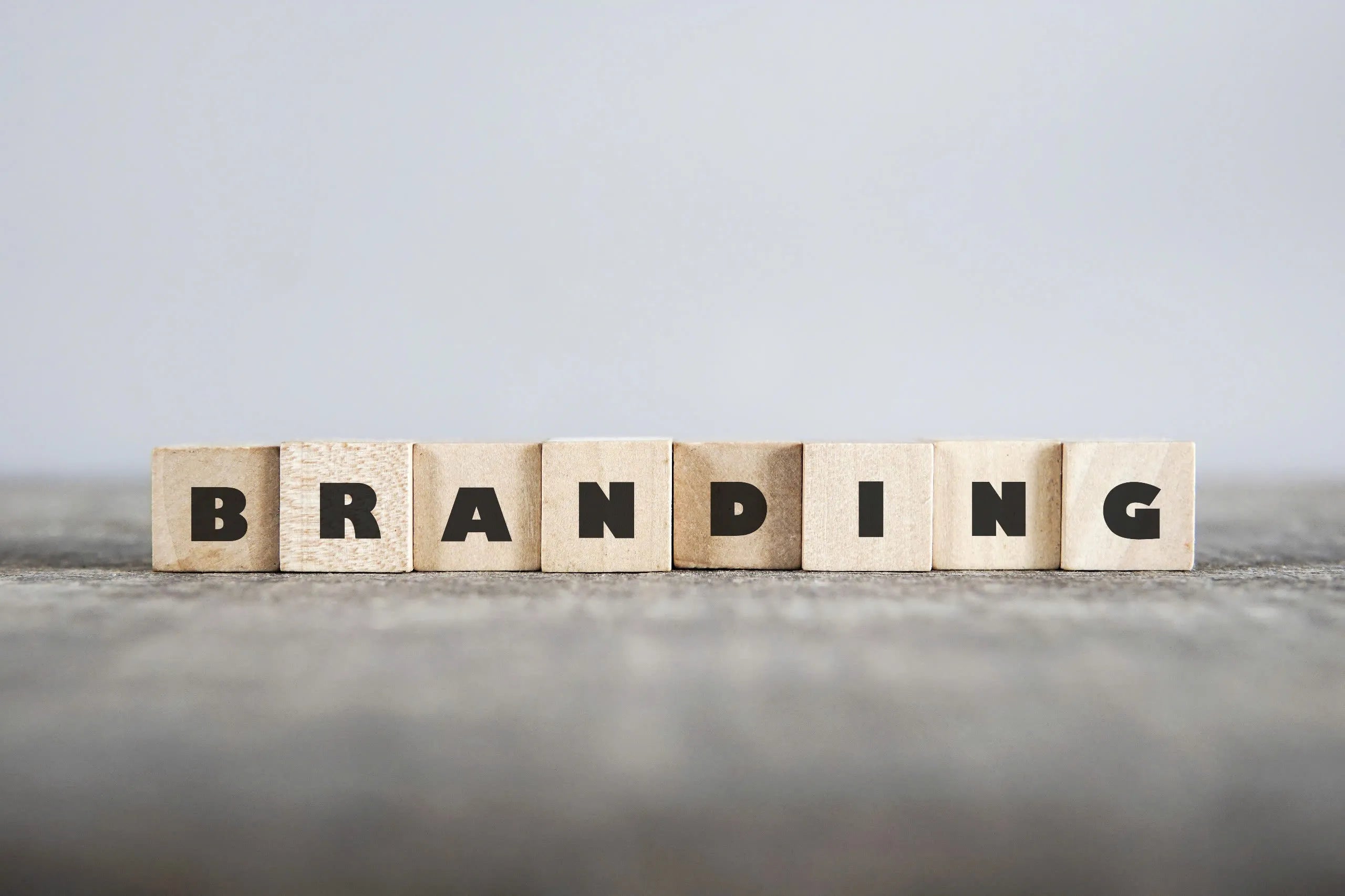 A photo that shows the word ‘branding’ with block letters.