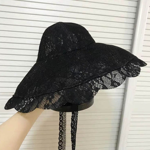 black floppy wedding hat