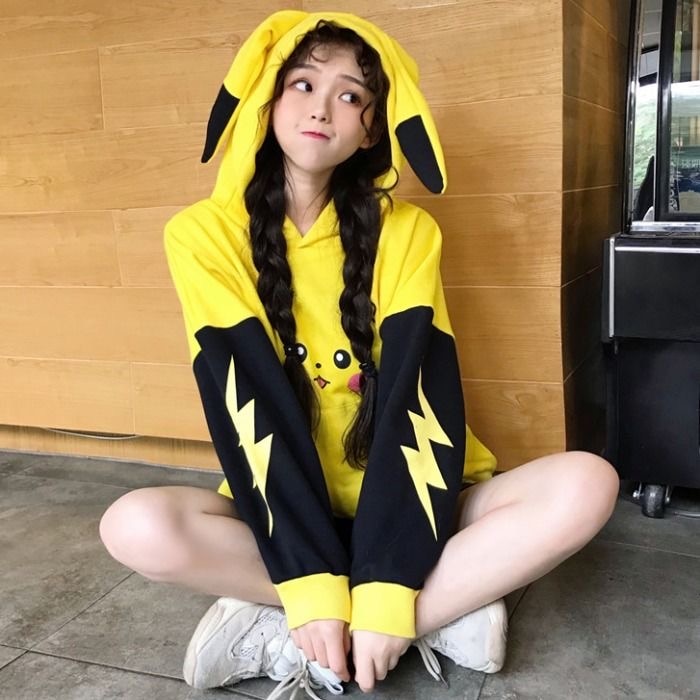 girl in pikachu hoodie