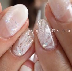 Translucent Feather Nail Designs