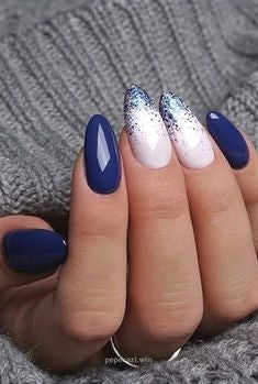 Snow and Blue Winter Nail Designs