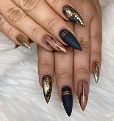 Golden and Black Marble stiletto Nail Designs