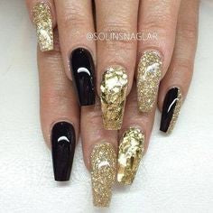 Luxurious Black and gold nail design