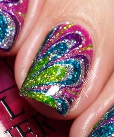 Artistic rainbow glitter nails