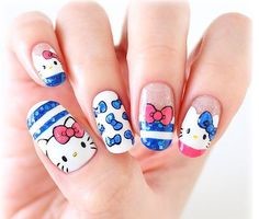 Hello Kitty Cobalt Blue Nail Design