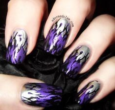 Purple and silver flame nail design