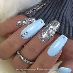 Light blue glitter crystal nail design