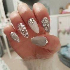 Matte black and white crystal nail design