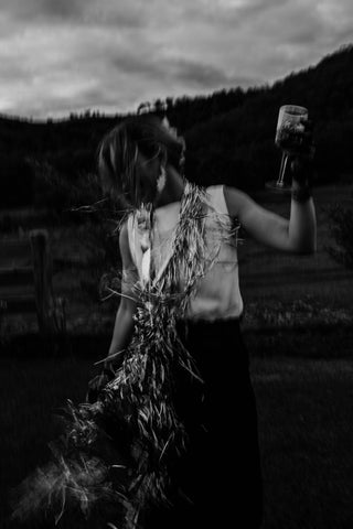 black and white photo of party girl with linen outfit for new years outfit australian designed