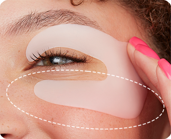 Retinol Eye Lift Patch on a woman's face with a circle around the skin below the eye.