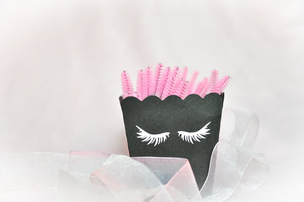 Lash supplies with mascara wands to brush lashes. Cartel Lash