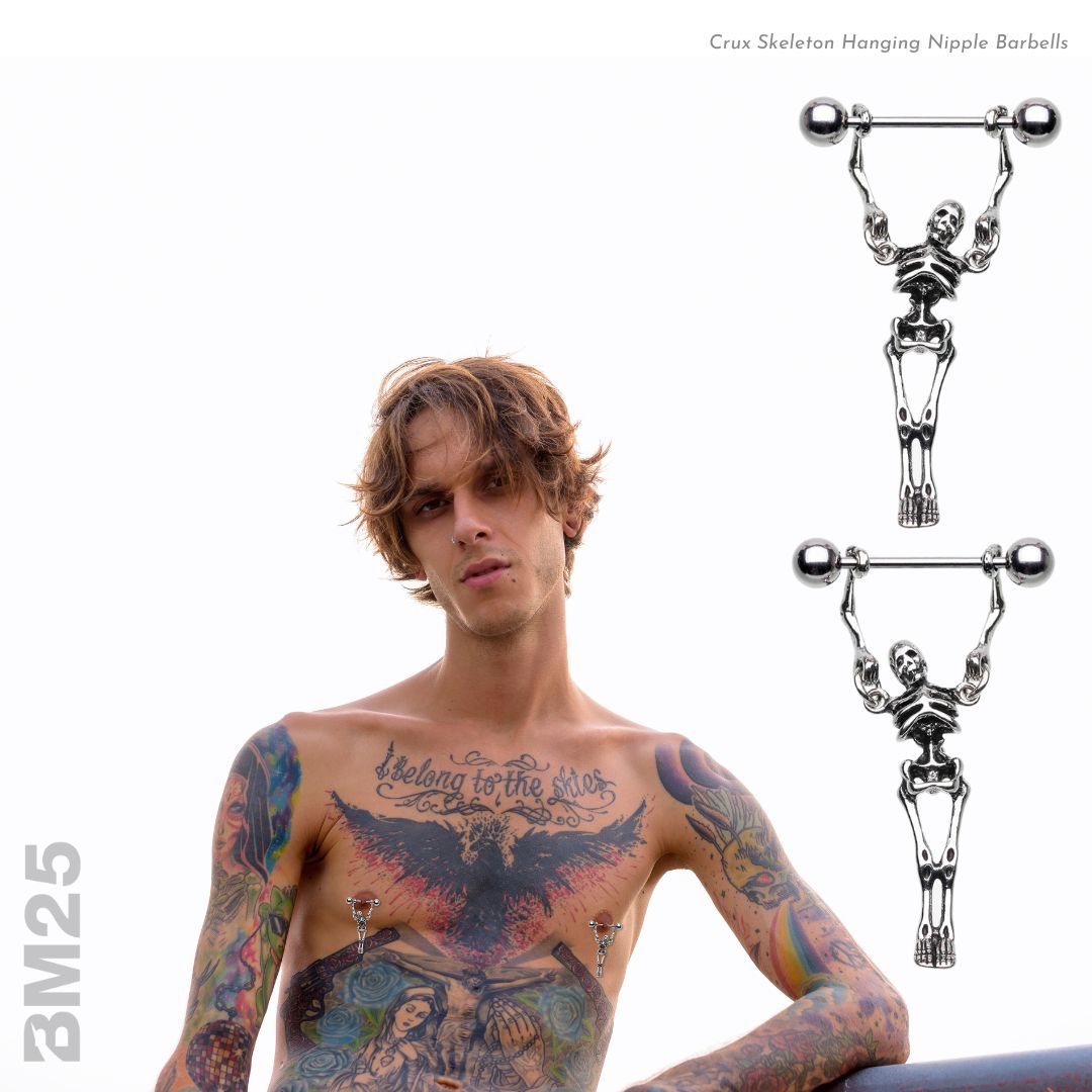 Alternative style man with tattoos wears nipple barbell piercing jewelry from bm25.com