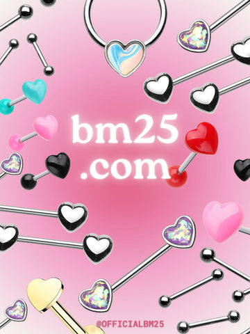 An arrangement of heart shaped and valentines day themed body jewelry around the bm25.com logo
