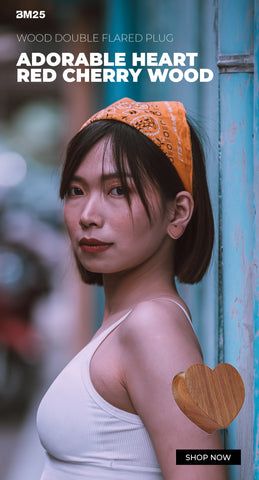 Young woman wearing wooden jewelry gauges from bm25.com