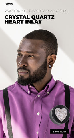 Young Man wearing Wooden jewelry plugs with a crystal quartz inlay from bm25.com