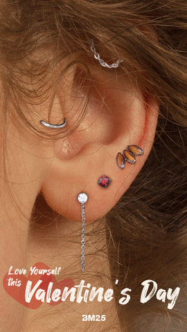 Young woman wears a currated Earscape using BM25 body jewelry