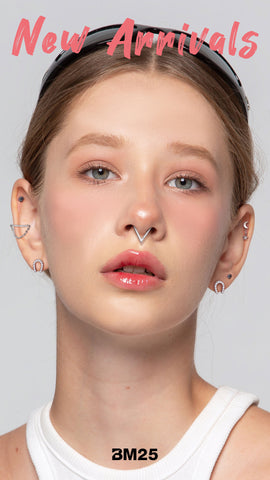 Young woman wears an Ear Curation of body jewelry from BM25.com