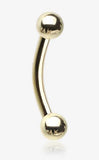 14 Karat Yellow Gold Basic Curved Barbell with two solid gold ball ends.